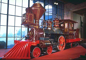The red painted pilot, 'cattle- or cowcatcher',  
at the front of probably a pioneer steam locomotive 
pushed obstructive cattle off the rails. 
Built in 1863. Source: www.parks.ca.gov; Magnus Manske 2008 commons.wikimedia